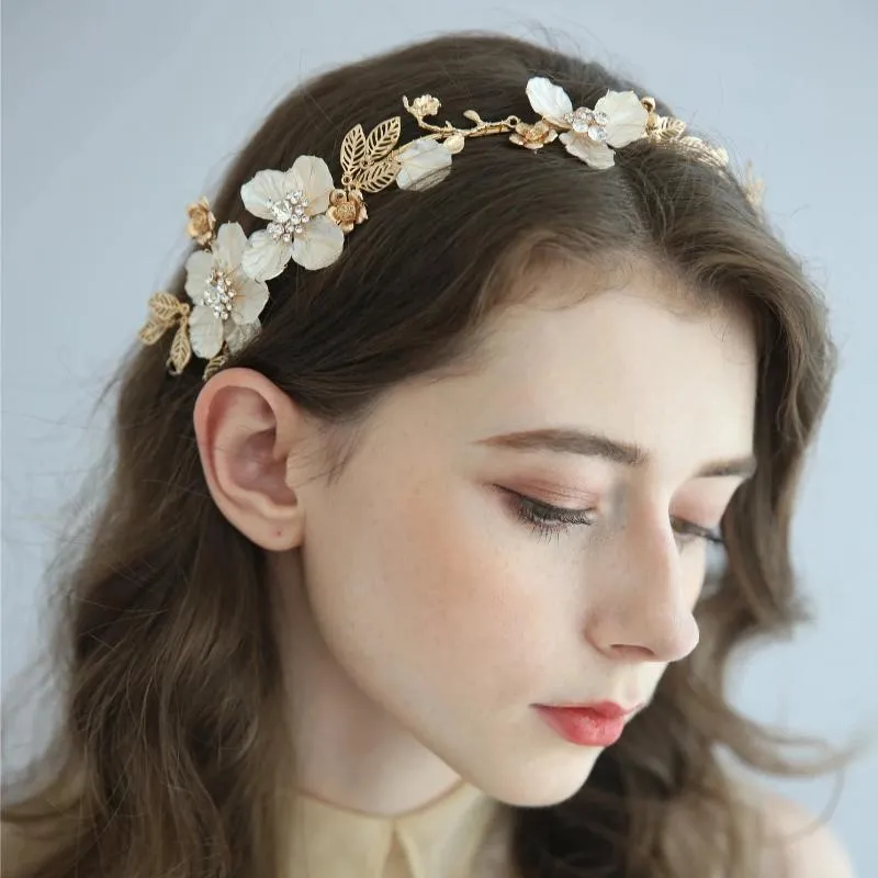 V140. gold romantic white flowery bridal hairpiece hair vine for weddings.